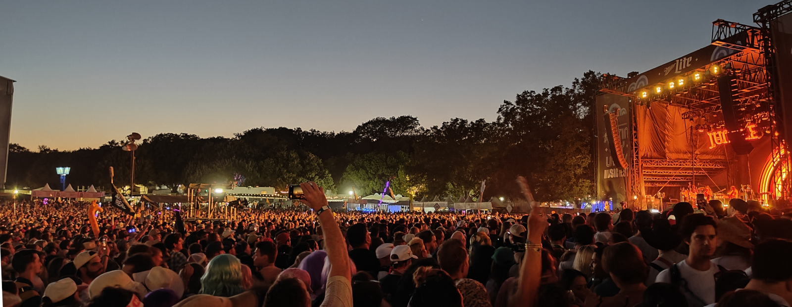 Crowd of people enjoying a live outdoor concert at Austin City Limits, a major annual music festival in the city